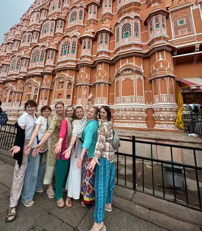 International tourists visiting Hawa Mahal Jaipur Rajasthan on a private Jaipur city tour with local guide